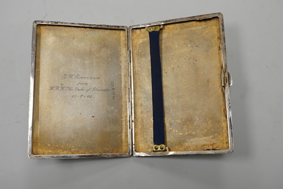 A George VI engine turned silver cigarette case, with interior engraved inscription relating to HRH Duke of Gloucester, Mappin & Webb, Birmingham, 1941, 11.4cm.